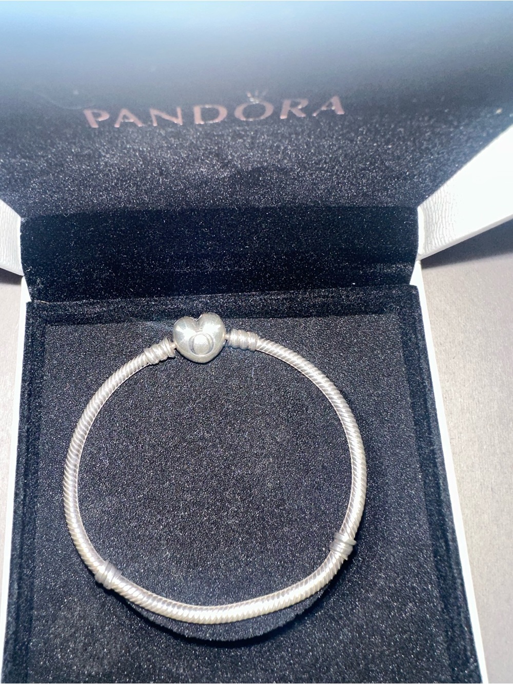 Pandora Silver Snake Chain Bracelet in Silver. Heart closure..